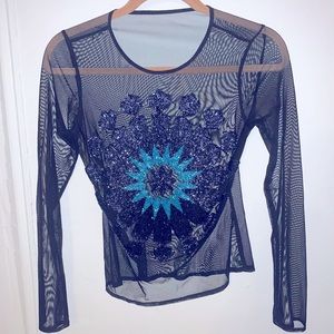 Blasts of classy, intricate beading detail! Women’s shirt from Macy’s